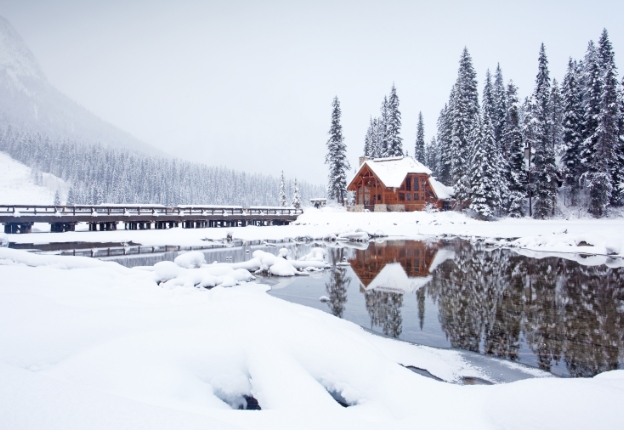 Emerald Lake Lodge in winter with mountain backdrop